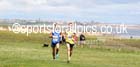 Andy Burn (Jarrow) leads Chris Isherwood (Sunderland) during the Pier to Pier, South Shields. Photo: David: David T. Hewitson/Sports for All Pics